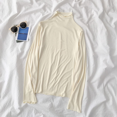 Sieviešu blūzes vienkāršs modelis ar augstu apkakli