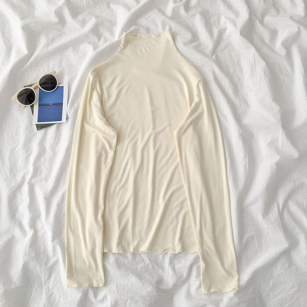 Sieviešu blūzes vienkāršs modelis ar augstu apkakli