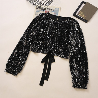 Sjajna ženska bluza sa šljokicama i okruglim izrezom