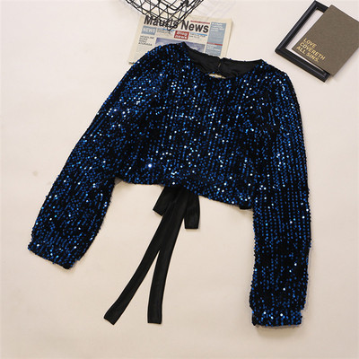 Sjajna ženska bluza sa šljokicama i okruglim izrezom