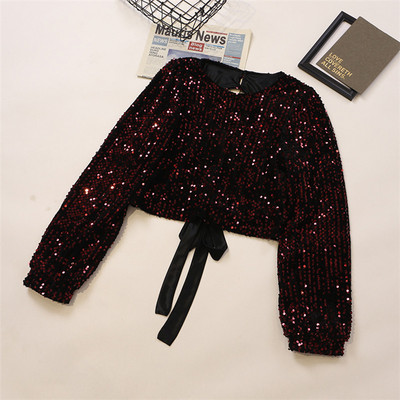 Sjajna ženska bluza sa šljokicama i okruglim izrezom