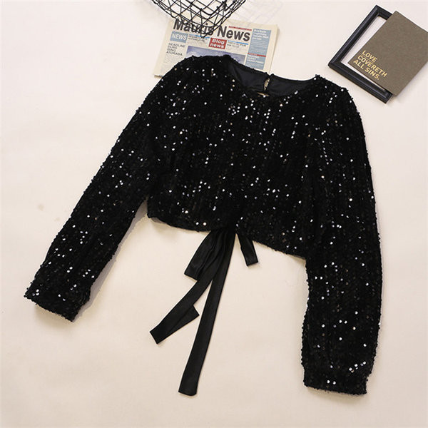 Sjajna ženska bluza sa šljokicama i okruglim izrezom