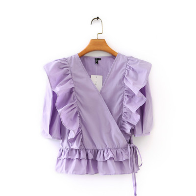 Ασύμμετρη μπλούζα με βολάν σε λευκό χρώμα