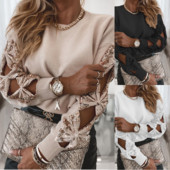 Moderna ženska bluza s rupama na rukavima i šljokicama