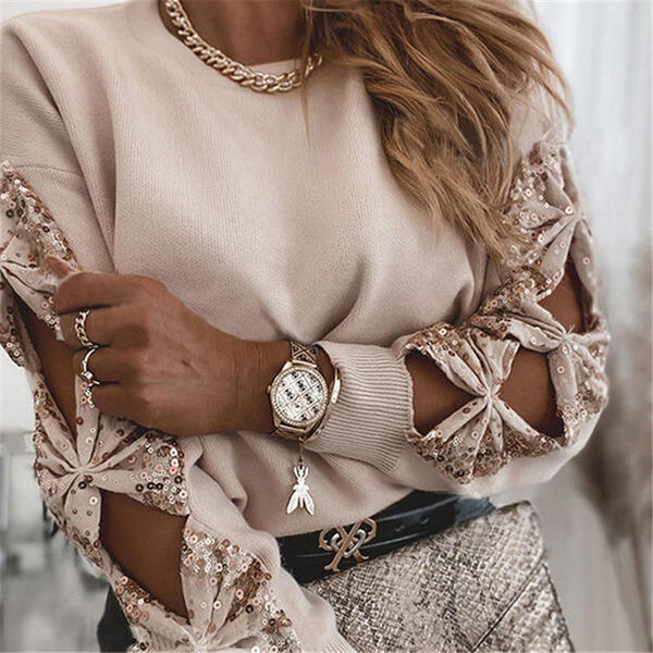 Moderna ženska bluza s rupama na rukavima i šljokicama