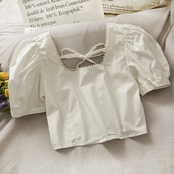 Μοντέρνα γυναικεία μπλούζα με φαρδιά μανίκια και πέρλες