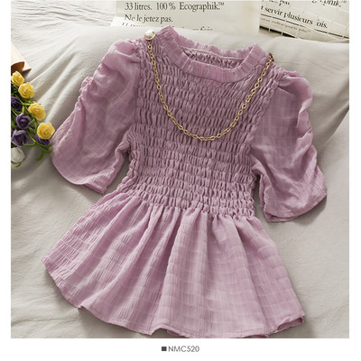 Μοντέρνα γυναικεία μπλούζα με μεταλλικό στοιχείο