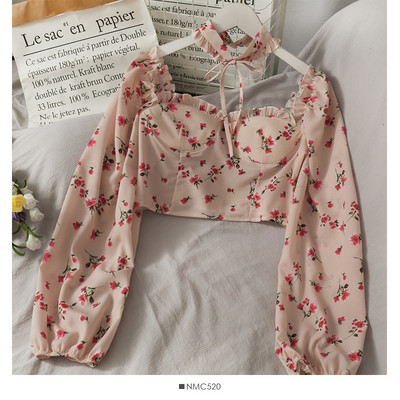 Kratka ženska bluza sa širokim rukavima i vezicama