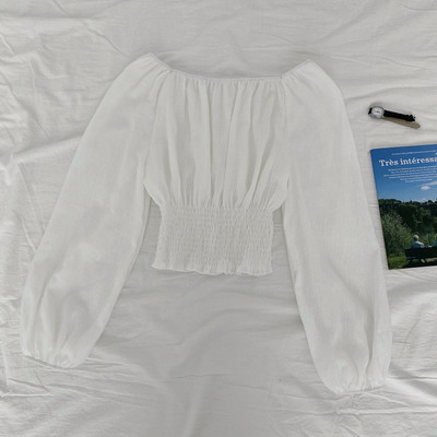 Μοντέρνα γυναικεία μπλούζα με λαιμόκοψη και μακριά μανίκια