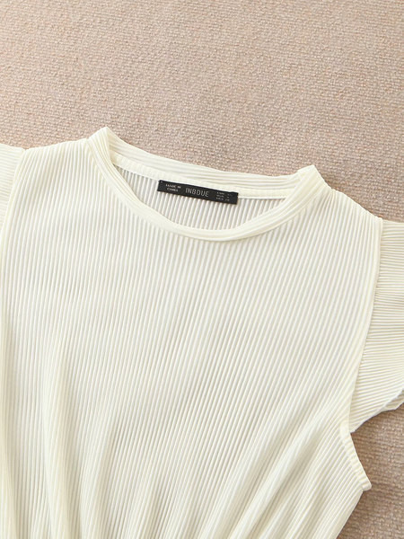 Κοντή γυναικεία μπλούζα με ελαστική μέση και βολάν