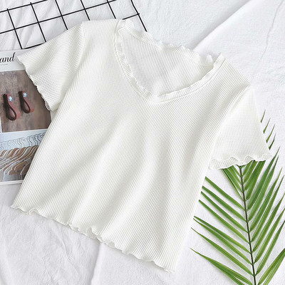 Κοντή γυναικεία μπλούζα από κοτλέ με βολάν