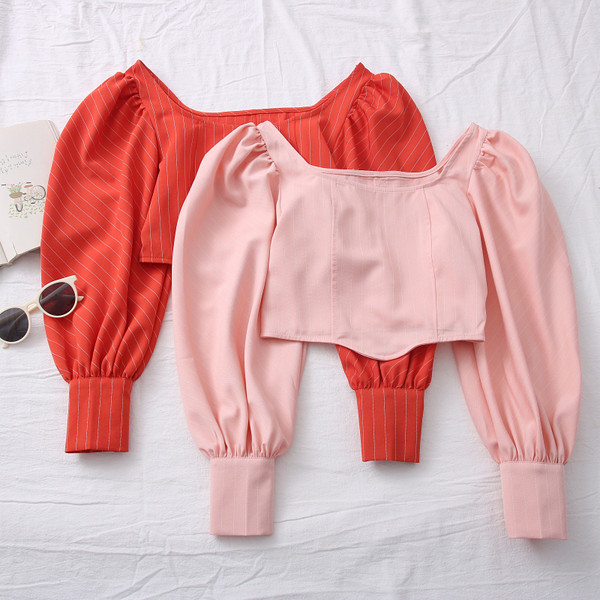 Novi model ženske bluze na pruge sa okruglim izrezom i puf rukavima