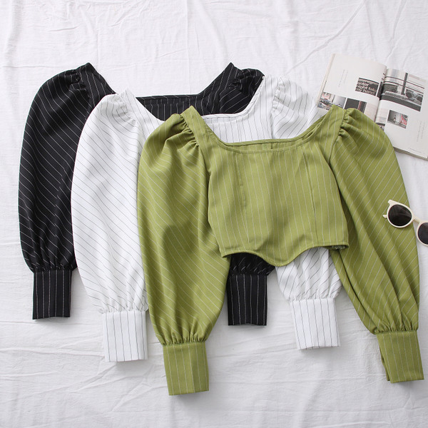 Novi model ženske bluze na pruge sa okruglim izrezom i puf rukavima