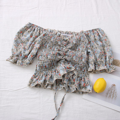 Πολύχρωμη γυναικεία μπλούζα με ντεκολτέ