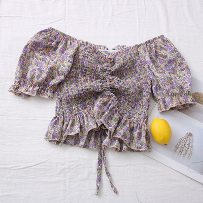 Πολύχρωμη γυναικεία μπλούζα με ντεκολτέ