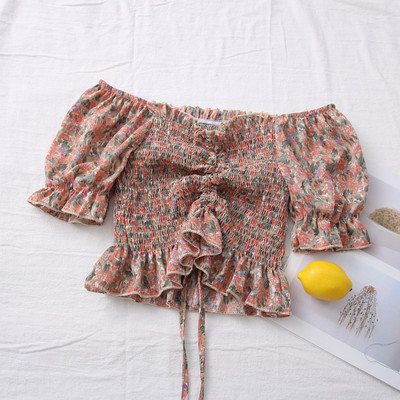 Πολύχρωμη γυναικεία μπλούζα με ντεκολτέ