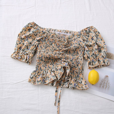 Πολύχρωμη γυναικεία μπλούζα με ντεκολτέ