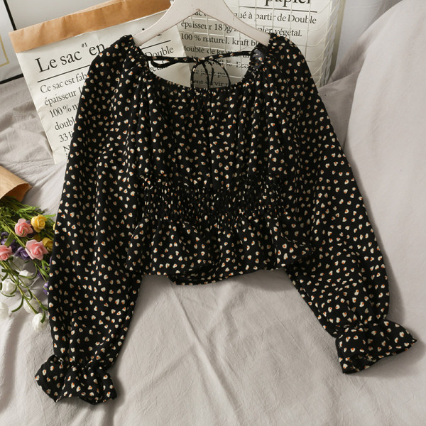 Ženska bluza na točkice s dugim rukavima i vezicama