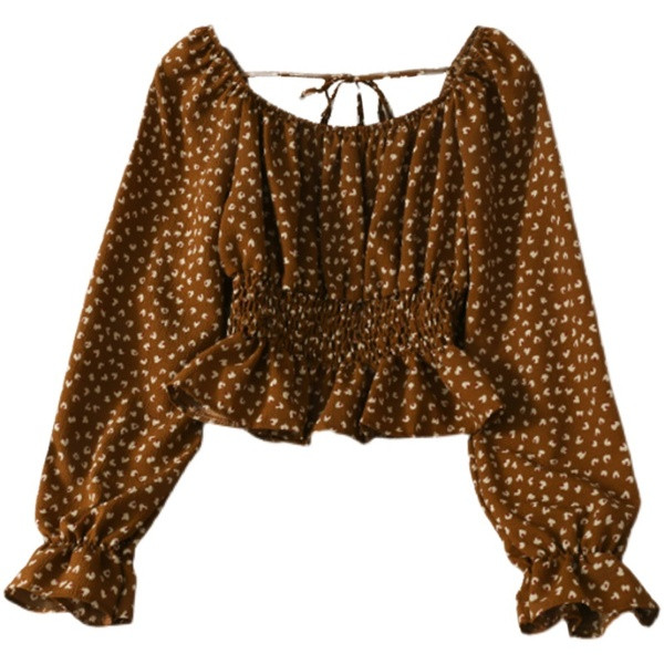 Ženska bluza na točkice s dugim rukavima i vezicama