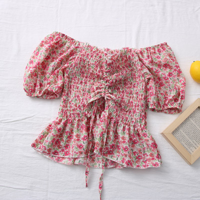 Ležerna ženska bluza - s vezama i lađa izrezom