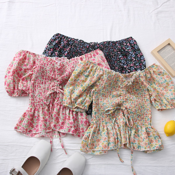 Ležerna ženska bluza - s vezama i lađa izrezom