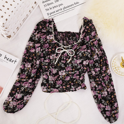 Ženska bluza s biserima i četvrtastim izrezom