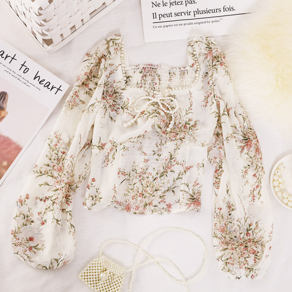 Ženska bluza s biserima i četvrtastim izrezom