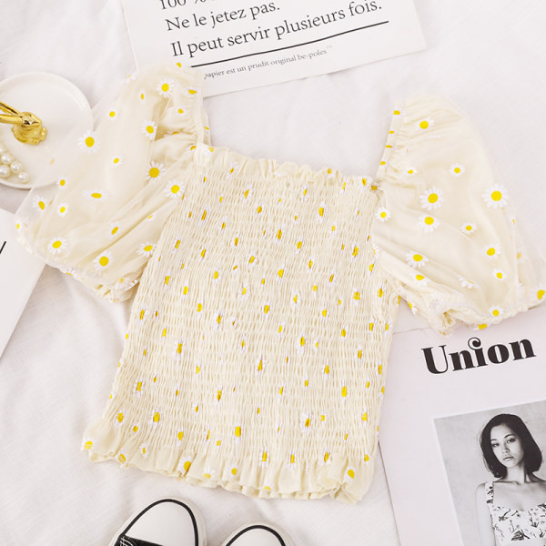 Ženska bluza kratkih rukava i cvjetnih motiva