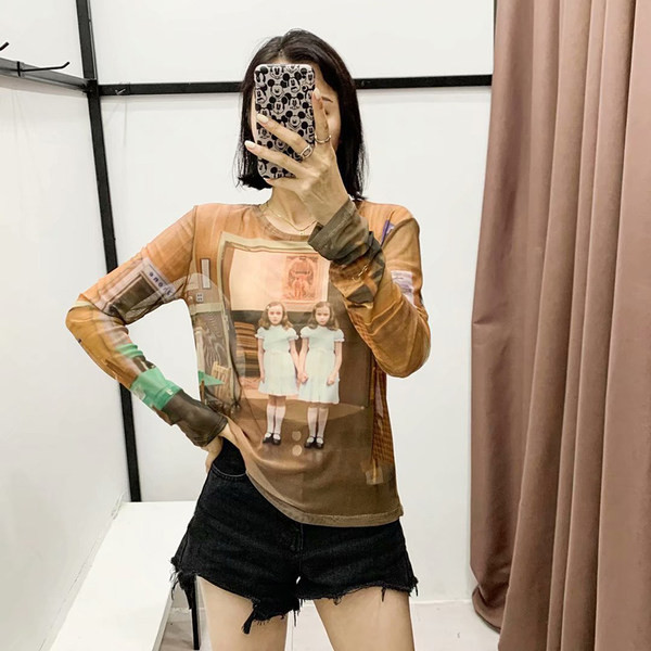 Γυναικεία μπλούζα με χρωματιστά μοτίβα και μακριά μανίκια