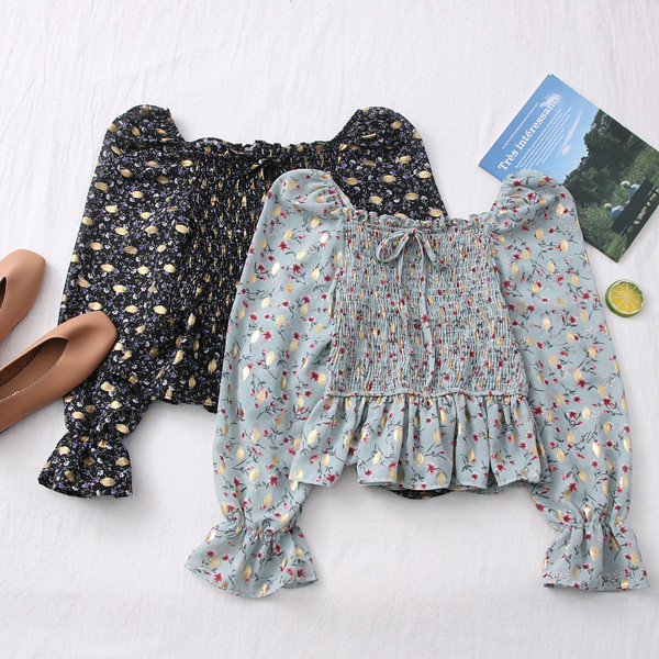 Μοντέρνα γυναικεία μπλούζα με μανίκια λωτού και ντεκολτέ 