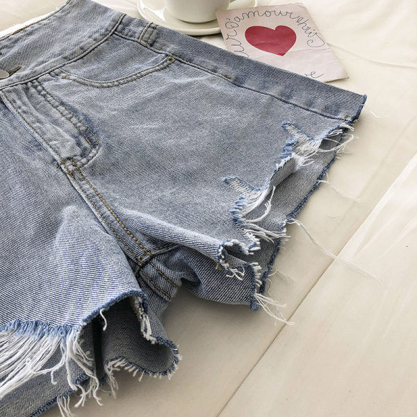 Kratke traperice s visokim strukom i džepovima