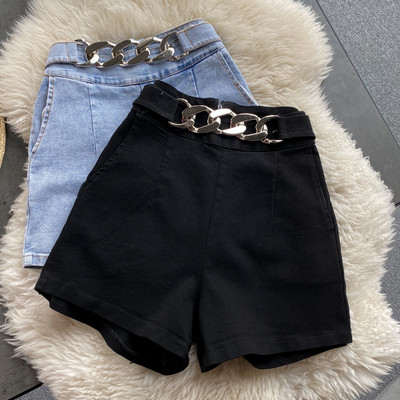 Ženske traperice s metalnim lancem