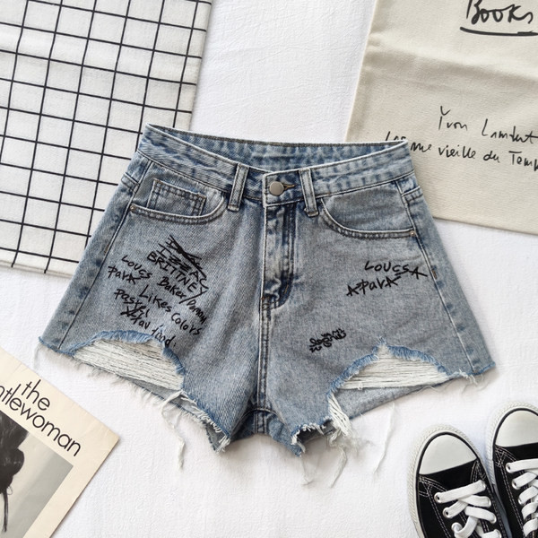 Ženske traper kratke hlače s poderanim uzorkom