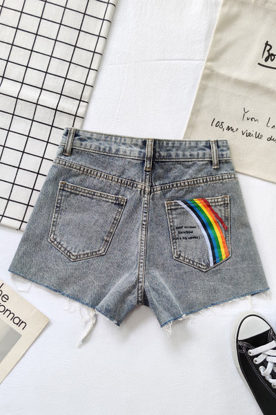 Ženske moderne traperice s aplikacijom u sivoj boji