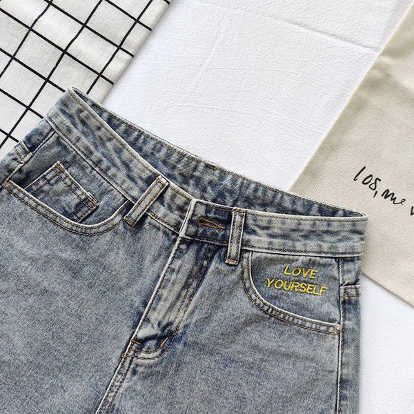 Ženske moderne traperice s aplikacijom u sivoj boji