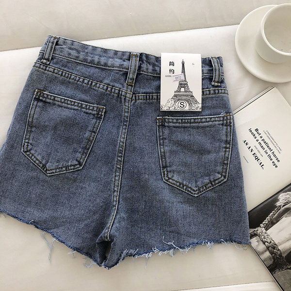 Ženske kratke traperice s džepovima i poderanim motivom