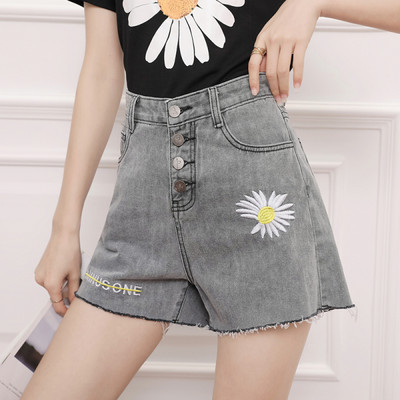 Γυναικεία τζιν με χρωματιστώ απλικέ και ψηλή μέση