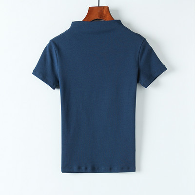 Vienspalvė moteriška palaidinė trumpomis rankovėmis ir polo apykakle