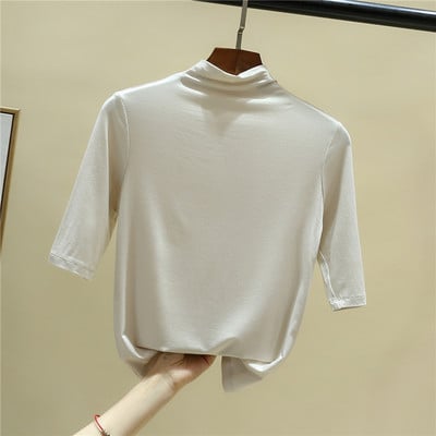 Bluză casual de damă cu mâneci 3/4 și guler polo înalt