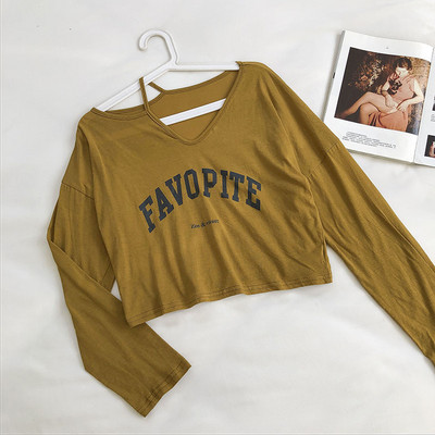 Bluză scurtă de damă cu mâneci lungi și decolteu spitz