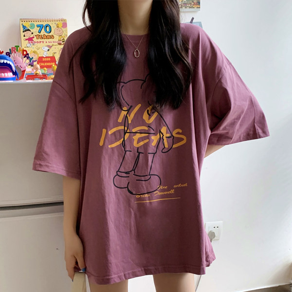 Bluză lată modernă de damă cu aplicație colorată