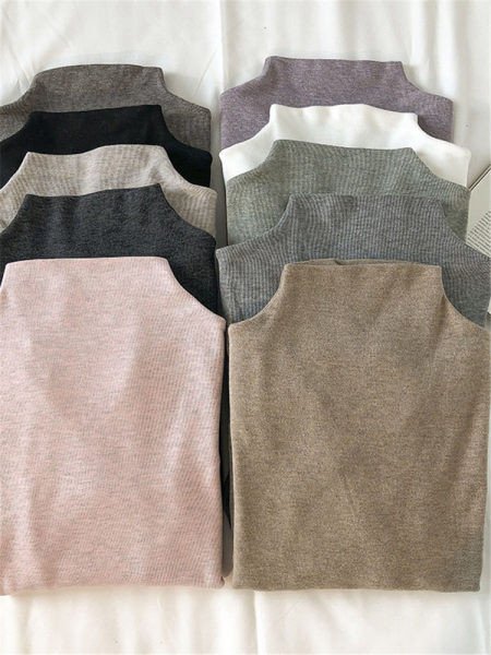 Bluză de damă simplă cu mâneci lungi și guler polo