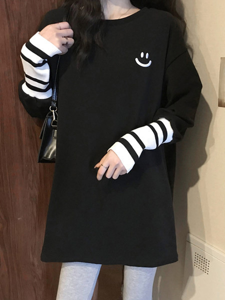 Bluză de damă model larg cu mâneci lungi în alb și negru