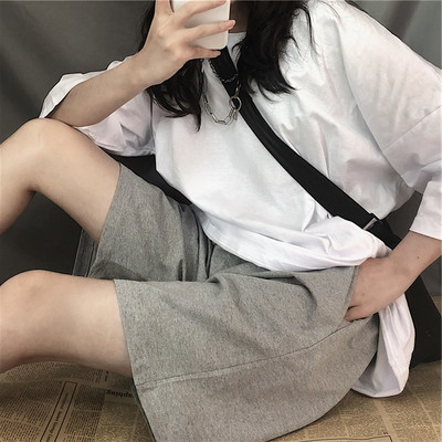 Pantaloni largi lejer până la genunchi