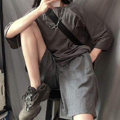 Pantaloni largi lejer până la genunchi