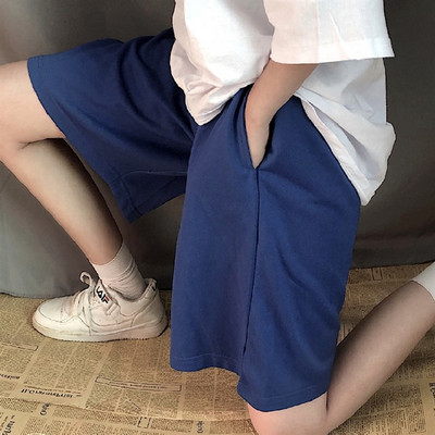 Pantaloni largi lejer până la genunchi