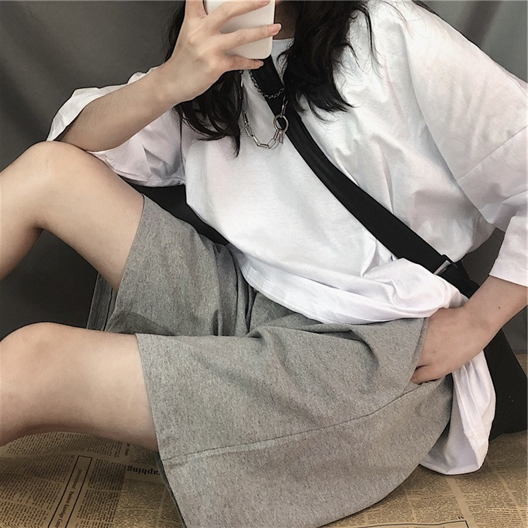 Pantaloni largi lejer până la genunchi