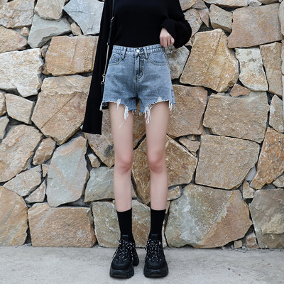 Blugi de damă rupti cu talie înaltă