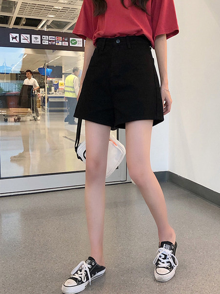 Pantaloni scurți de damă cu talie înaltă și buzunare în alb-negru