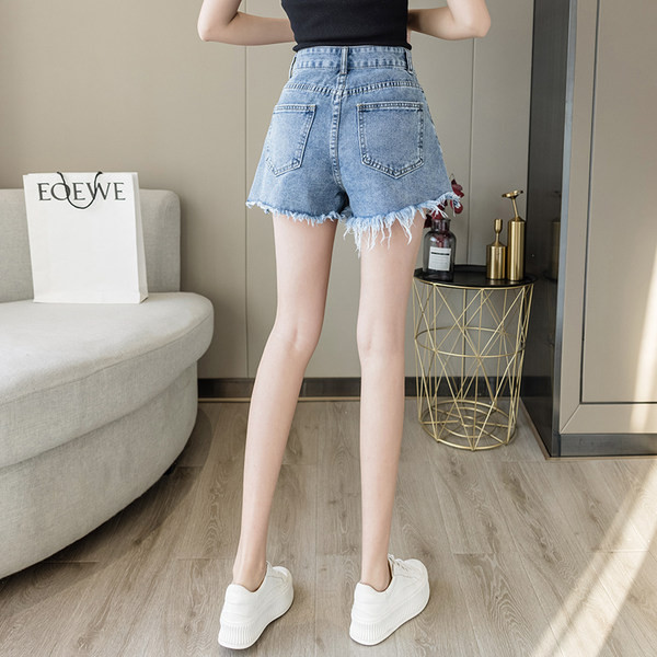 Model nou de pantaloni scurți din denim de damă de culoare albastră